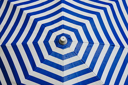 white and blue striped umbrella thumbnail