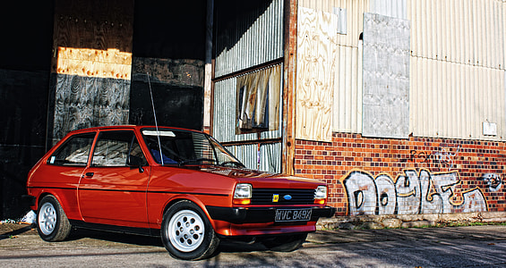 red 3-door hatchback thumbnail