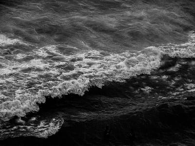 grayscale photography of ocean waves thumbnail