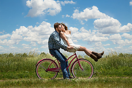 man and woman riding bicycle thumbnail
