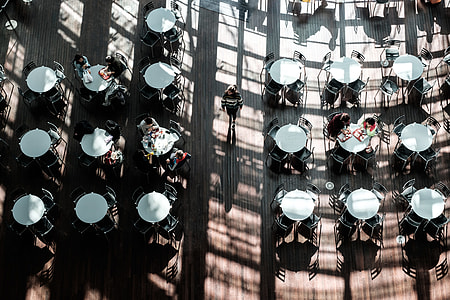 bird's eye view photo of people sitting on chair thumbnail