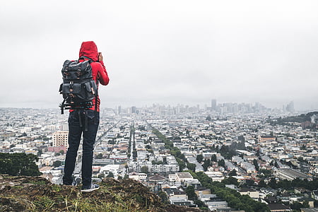 person wearing black backpack thumbnail