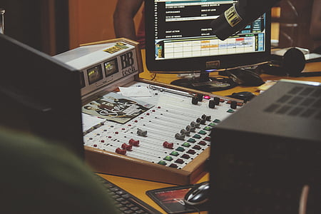 white and brown audio mixer on table thumbnail