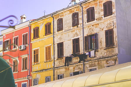 close-up photo of yellow and white building thumbnail