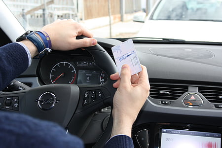 person holding white card thumbnail