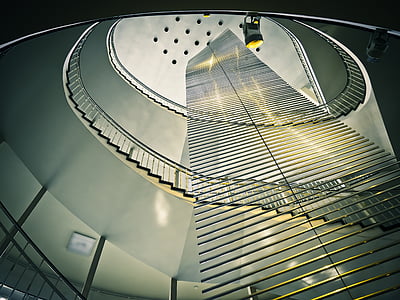 low angle photo of spiral stairs thumbnail