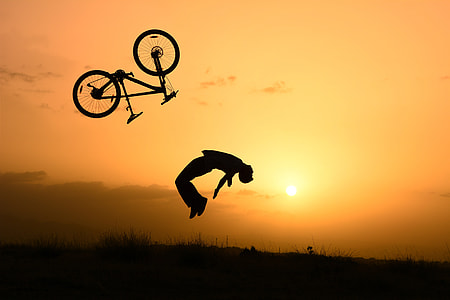 Stunt Cyclist at Sunset  thumbnail