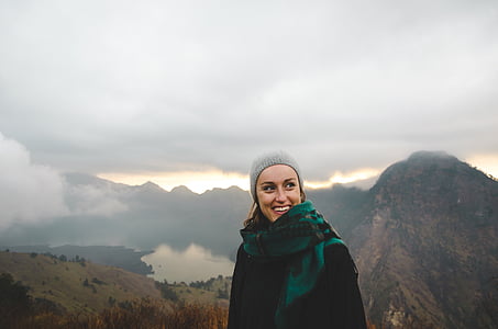 woman standing near mountain thumbnail