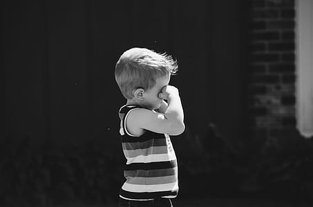 child in striped tank top thumbnail