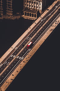 aerial photograph of people walking on sidewalk thumbnail