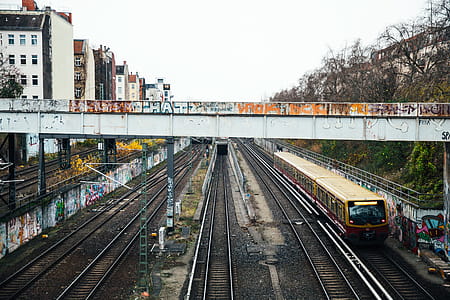 Graffiti walls near a train subway bridge and tracks thumbnail