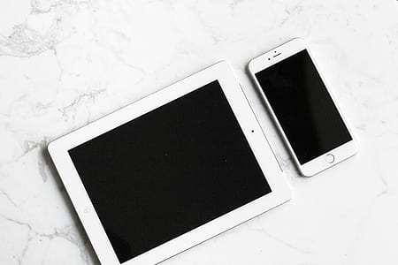 white iPad on white surface thumbnail
