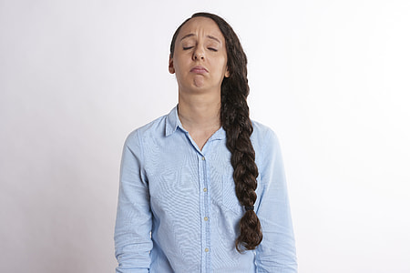 woman closing her eyes with braided hair thumbnail