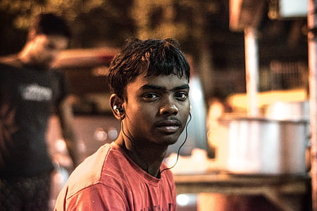 man listening on earbuds thumbnail