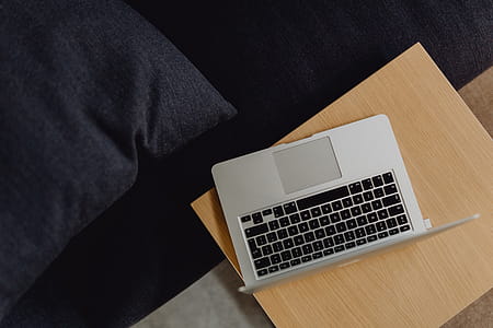 Stylish workspace with MacBook computer on home or studio thumbnail