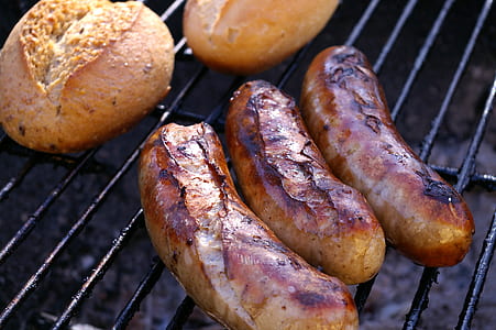 grilled sauges and two breads on outdoors thumbnail