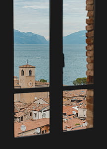 person's view inside room with glass panel window pane thumbnail