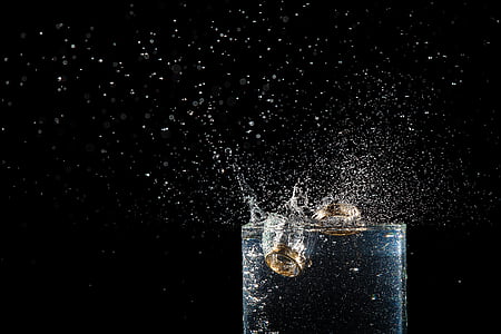 water on clear glass with ice thumbnail