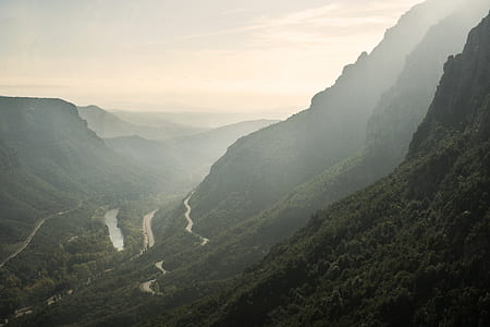 landmark photography of mountain under white cloudy skies thumbnail