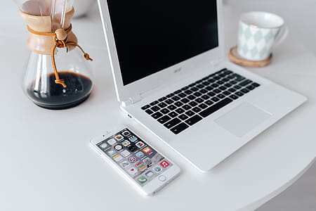 Workplace with laptop on table at home thumbnail