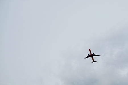 silhouette of airplane on mid air thumbnail