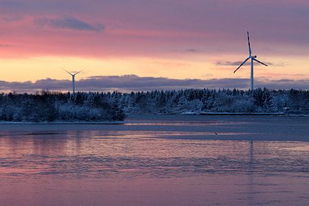 two wind turbines on island photo thumbnail
