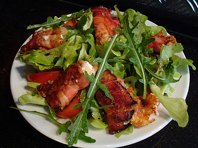 grilled meats with vegetables on round white plate thumbnail