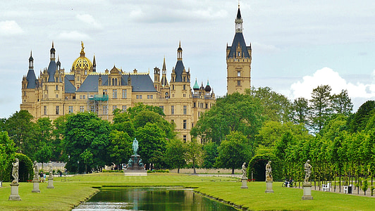 beige castle near trees thumbnail