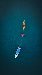 aerial view of boat pulling banana boat thumbnail