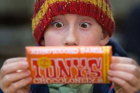man holding Tony's chocolonely wrapper thumbnail