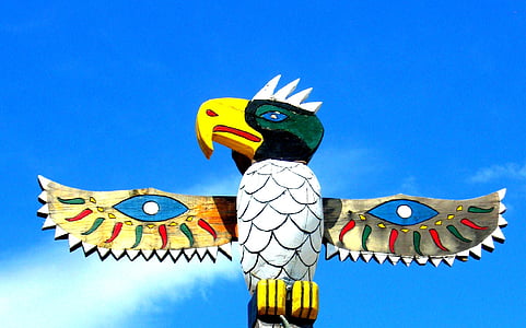 multicolored wooden eagle totem statue thumbnail