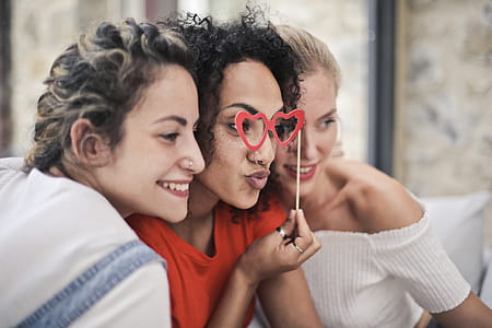 Three Women Posing For Photo thumbnail