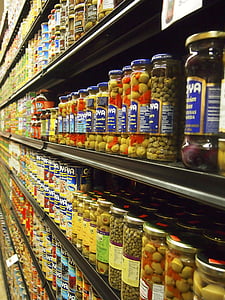 person taking photo of jars thumbnail