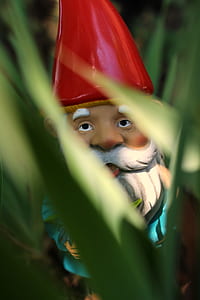 shallow focus of garden gnome figurine thumbnail