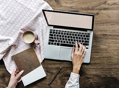 person using MacBook Pro thumbnail