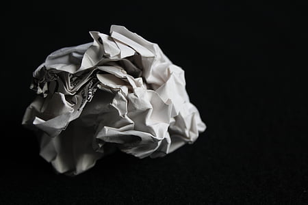 crumpled white printer paper with dark background thumbnail