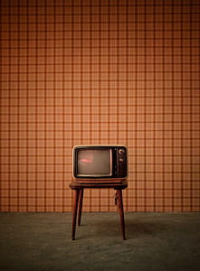 turned off CRT television on top of wooden table thumbnail