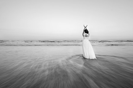 grayscale photographed of woman wearing white dress thumbnail
