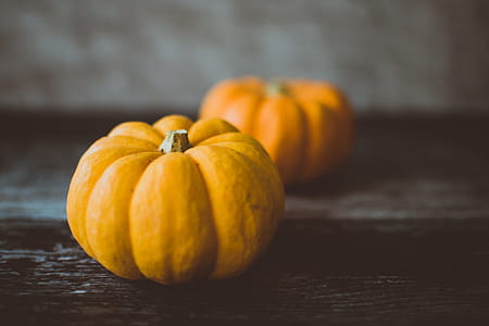 Two Yellow Pumpkins on Table thumbnail