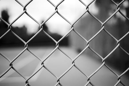 grayscale photography of chain-link fence thumbnail