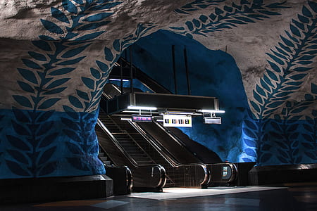 gray escalator under the cave thumbnail