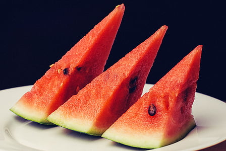three slices of watermelons on plate thumbnail