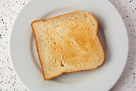 closeup photo of toasted bread with butter spread thumbnail