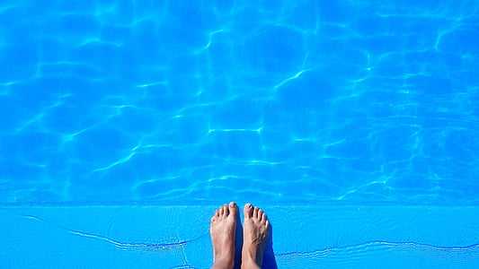 person stand in front of water thumbnail