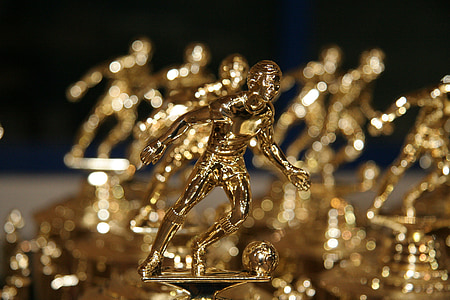 gold-colored soccer trophies thumbnail