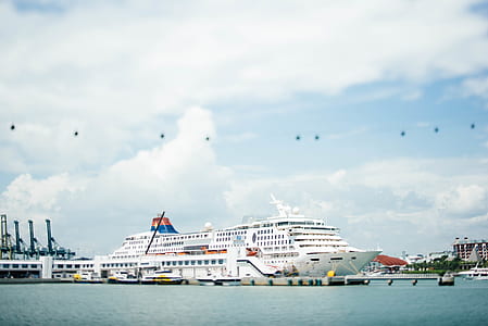 white cruise ship on body of water thumbnail