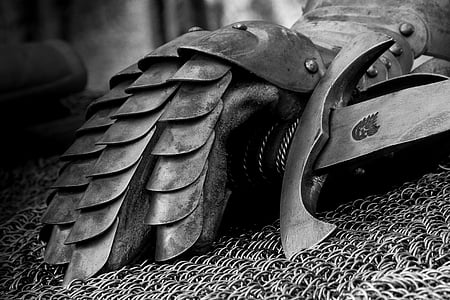 grayscale photography of sword thumbnail