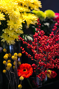 Red rowan with a colourful arrangement of flowers thumbnail