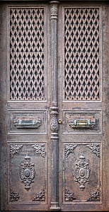 closeup photo of brown wooden door thumbnail