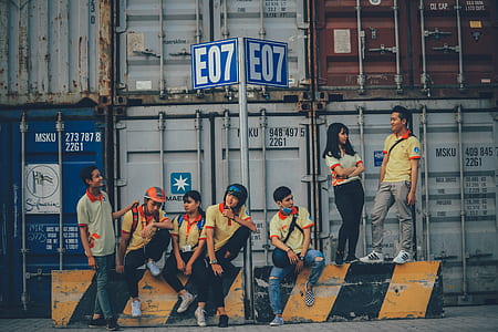 men and women near container thumbnail
